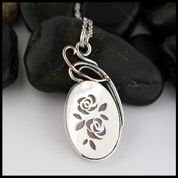 Custom Rose Quartz Floral pendant in Sterling Silver with 14K Rose Gold accent.
