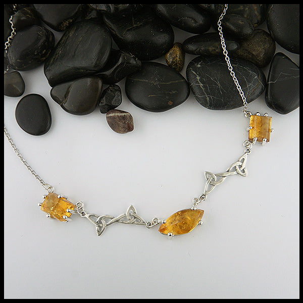 Custom Celtic Pendant with 3 links set with freeform cabochon Citrine and two trinity knot links. 