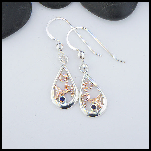 Custom Sterling Silver tear drop earrings with 14K Rose Gold trinity knots and accents, set with a 2mm Sapphire. 