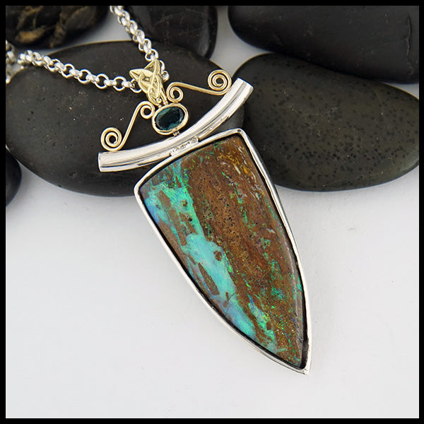 Custom Opal pendant in Sterling Silver and 18K Yellow Gold set with an accented oval tourmaline.