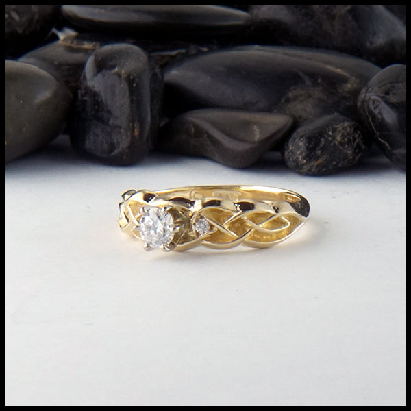 Celtic ring with reclaimed diamonds