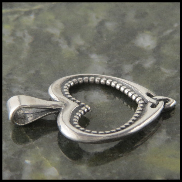 Ornate heart pendant in Sterling Silver