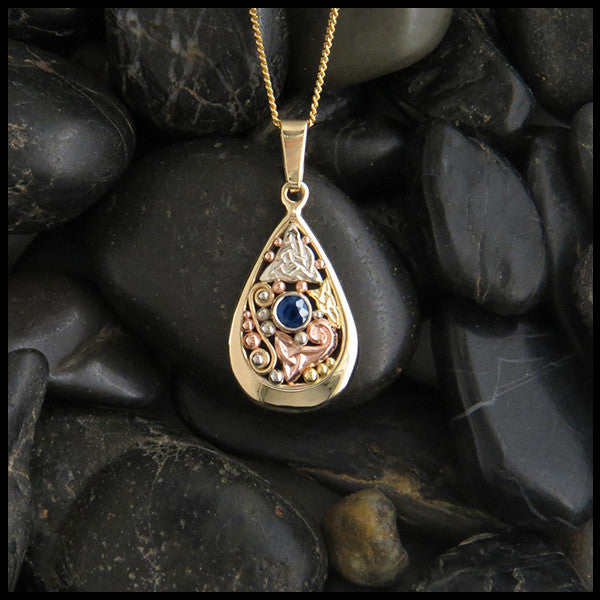 Sapphire Celtic teardrop pendant in Gold