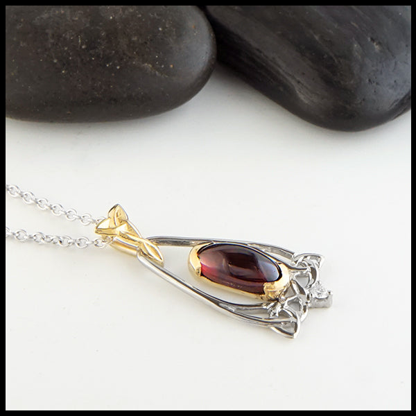Oval Garnet and Trinity Knot Gold Pendant
