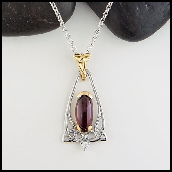 Oval Garnet and Trinity Knot Gold Pendant
